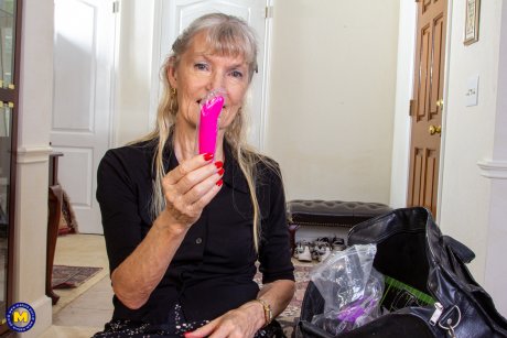 69 year old Candis has a bag full of kinky toys